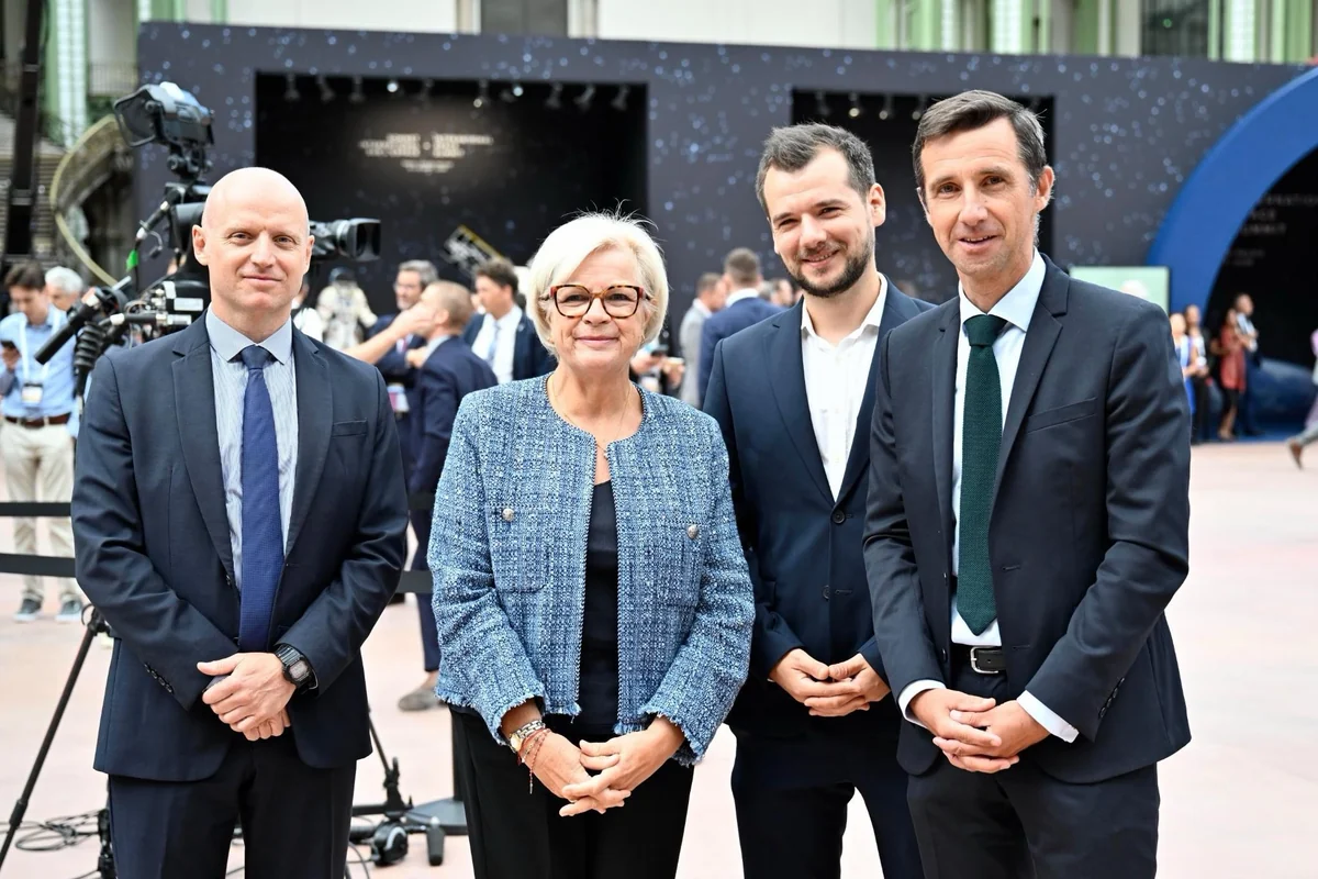 Four participants at the September 10, 2026 summit announcing the next step for Baguette One.