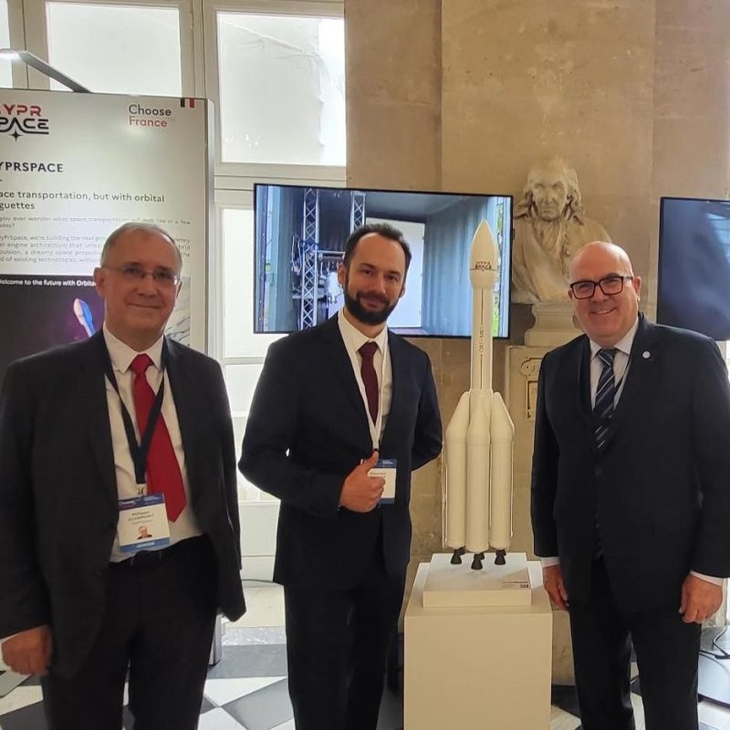 Philippe, Alexandre, M. Bonnell and Sylvain posing in front of our booth for Choose France in Versailles.